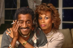 Sammy and Altovise Davis at his bar in his home. 002
